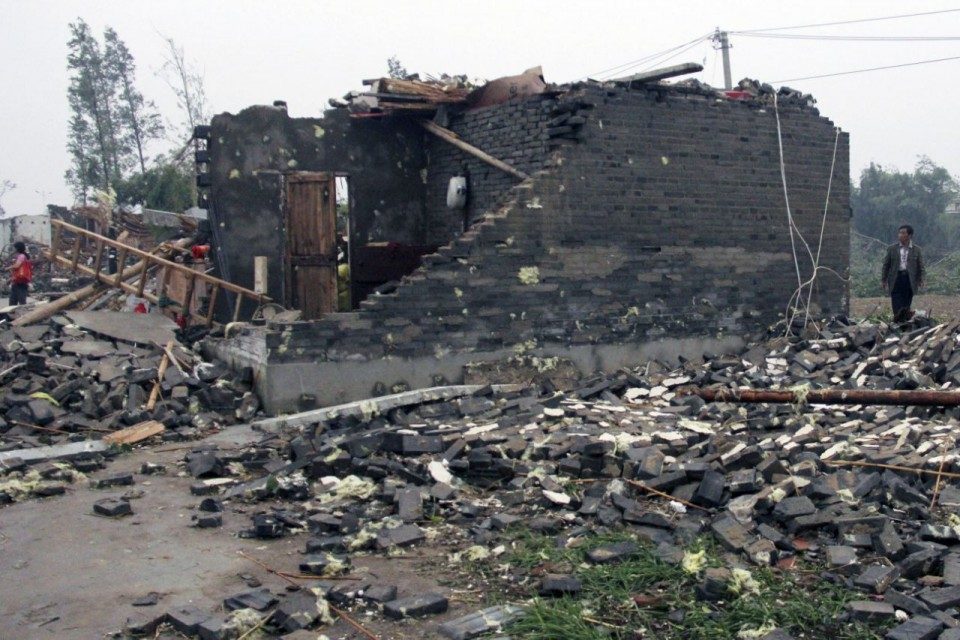 AFP photo, eastern china, 78 dead, storms in china