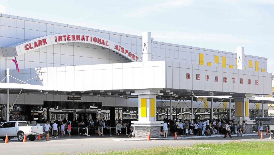 Clark Airport philippines, Clark Metro, Medical Tourism, man boards plane 