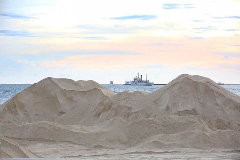 DENR has yet to say if dolomite sand washed out in Manila Bay