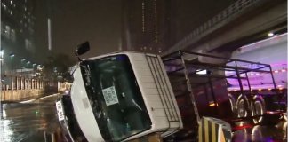 Delivery truck of coffins hit concrete barrier