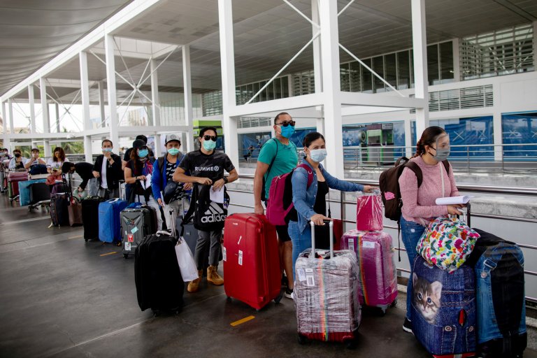 Displaced OFWs to get P10K cash aid upon arrival - DOLE