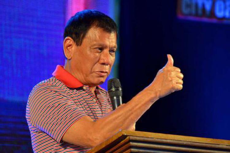 Duterte jokes naming typhoons after dilawans