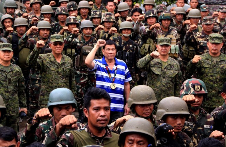 Duterte wants police, soldiers to be first recipients of Sinovac vaccines - Go