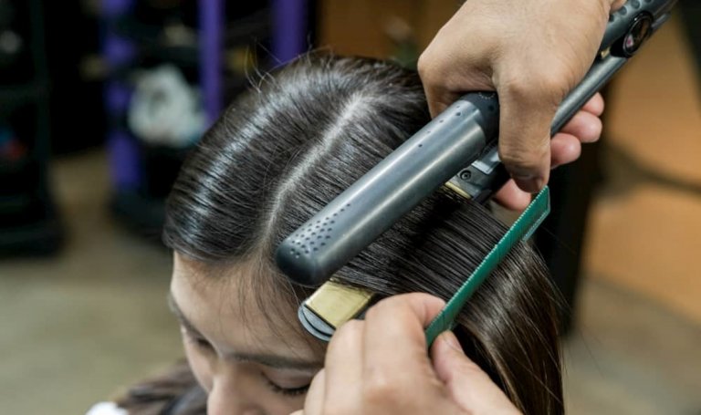 Employee gets hair rebonding on duty, inside LTO Dipolog