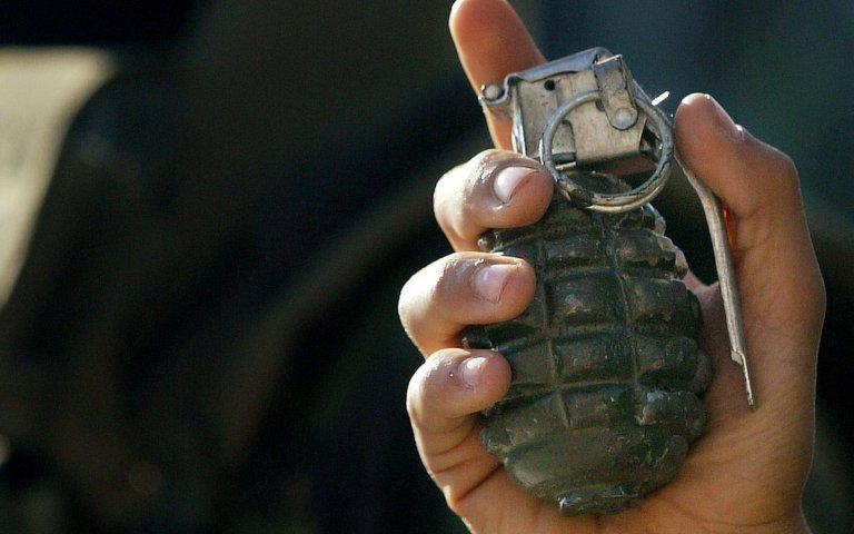 Man dead after playing with live grenade