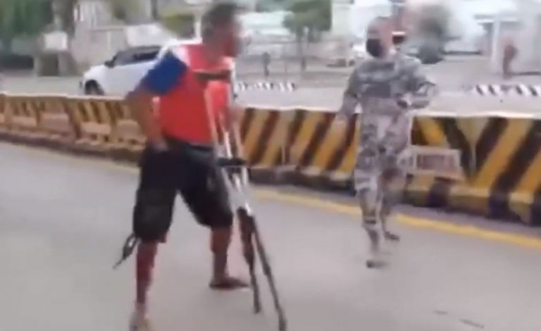 Man on crutches suddenly ran to stab traffic marshall
