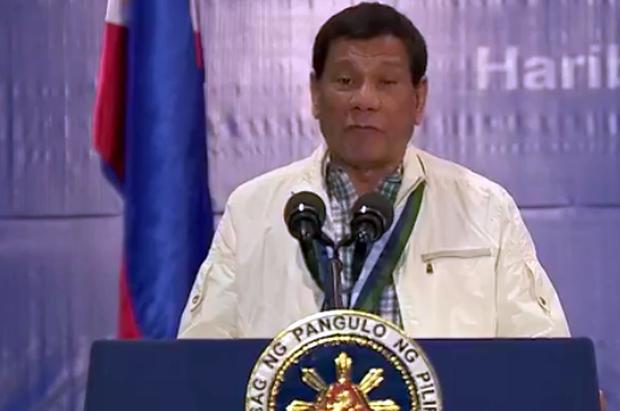 Rodrigo Duterte at turnover of arms from China Clark Air Base 28 June 2017