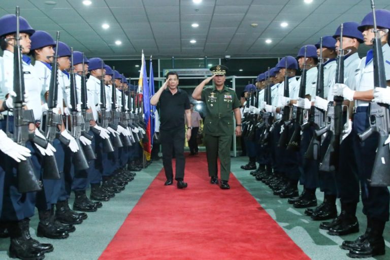 Rodrigo Duterte escorted by Armed Forces of the Philippines Chief of Staff Ricardo Visaya