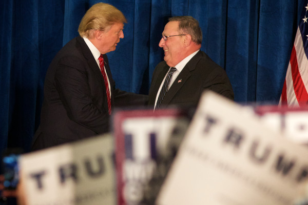 Donald Trump Slammed, PORTLAND, MAINE -- 03/03/16 -- Presidential candidate Donald Trump shakes hands with Maine Gov. Paul LePage on Thursday at a campaign rally in Portland. Troy R. Bennett | BDN