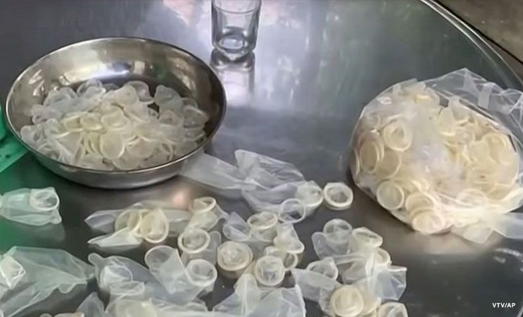 Vietnam police raid condom recycling warehouse