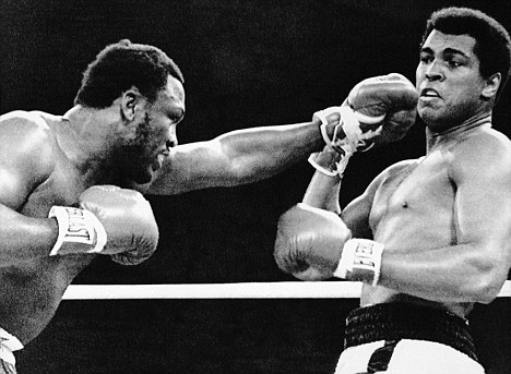 Joe Frazier Throwing Punch at Muhammad Ali
