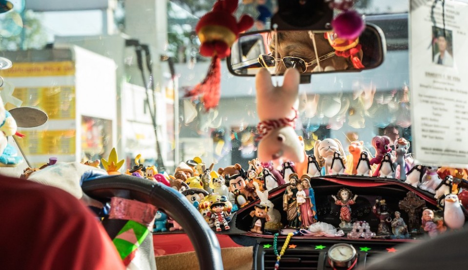 cab drivers manila toys kitsch makati Mr. Ernie figurines religion manila buddha drinks fanta 04392